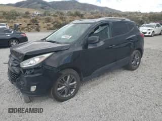 2015 Hyundai Tucson SE z VIN KM8JUCAG1FU103009, wystawiony jako Copart lot #65653235 z przebiegiem 153 064 mil mil oraz Szkoda całkowita • Salvage title. Historia ofert i sprzedaży dostępna na DreamBid. Obrazek 1.