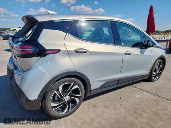 ✅ 2023 Chevrolet Bolt EV 2LT • VIN: 1G1FX6S07P4182989 • Lot: 84011405. Listed on Copart with 83,911 mi. Free auction sales archive from the USA and detailed vehicle history report at DreamBid. Image 3.