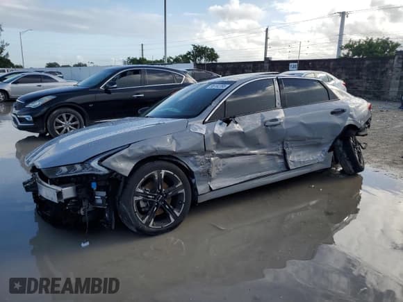 ✅ 2022 Kia K5 GT-Line • VIN: 5XXG64J27NG145045 • Лот: 85182395. Опубликован ранее на Copart с пробегом 62 971 миль. Бесплатный доступ к архиву аукционных продаж из США и подробный отчёт об истории автомобиля на DreamBid. Изображение 1.