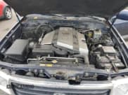 ✅ 2000 Toyota Land Cruiser • VIN: JT3HT05J0Y0082257 • Lot: 63392145. Listed on Copart with 355,619 mi. Free auction sales archive from the USA and detailed vehicle history report at DreamBid. Image 12.