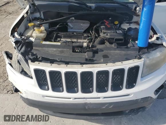 ✅ 2013 Jeep Compass Latitude • VIN: 1C4NJCEB0DD167701 • Лот: 64959015. Опубликован ранее на Copart с пробегом 154 623 миль. Бесплатный доступ к архиву аукционных продаж из США и подробный отчёт об истории автомобиля на DreamBid. Изображение 12.