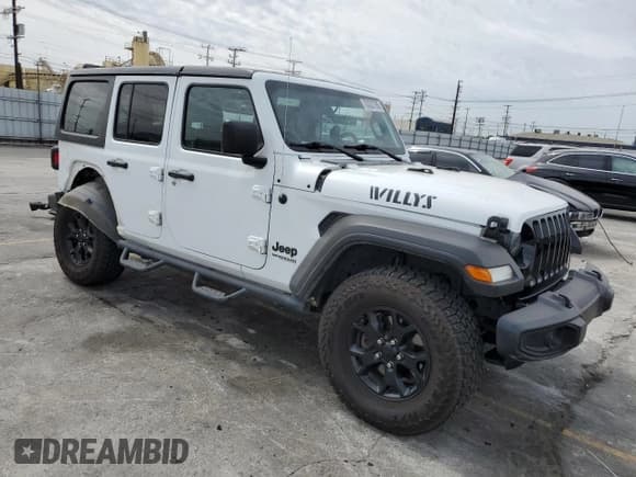 ✅ 2021 Jeep Wrangler Unlimited Willys Sport • VIN: 1C4HJXDG5MW614139 • Lot: 70332735. Listed on Copart with 79,608 mi. Free auction sales archive from the USA and detailed vehicle history report at DreamBid. Image 4.