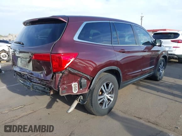 ✅ 2017 Honda Pilot EX-L • VIN: 5FNYF5H71HB027558 • Lot: 41910670. Listed on IAAI with 122,214 mi. Free auction sales archive from the USA and detailed vehicle history report at DreamBid. Image 4.