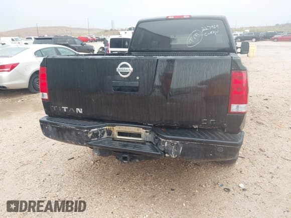 ✅ 2007 Nissan Titan SE • VIN: 1N6BA06AX7N227969 • Lot: 43748083. Listed on IAAI with 310,499 mi. Free auction sales archive from the USA and detailed vehicle history report at DreamBid. Image 6.