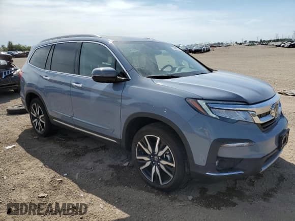 ✅ 2022 Honda Pilot Touring 7-Passenger • VIN: 5FNYF6H68NB037772 • Lot: 71996515. Listed on Copart with 23,900 mi. Free auction sales archive from the USA and detailed vehicle history report at DreamBid. Image 4.