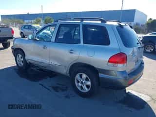 2005 Hyundai Santa Fe GLS z VIN KM8SC73D65U921240, wystawiony jako IAAI lot #41237664 z przebiegiem 149 771 mil mil oraz . Historia ofert i sprzedaży dostępna na DreamBid. Obrazek 3.