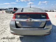 ✅ 2013 Honda Insight LX • VIN: JHMZE2H59DS003833 • Lot: 92709585. Listed on Copart with Not provided. Free auction sales archive from the USA and detailed vehicle history report at DreamBid. Image 6.