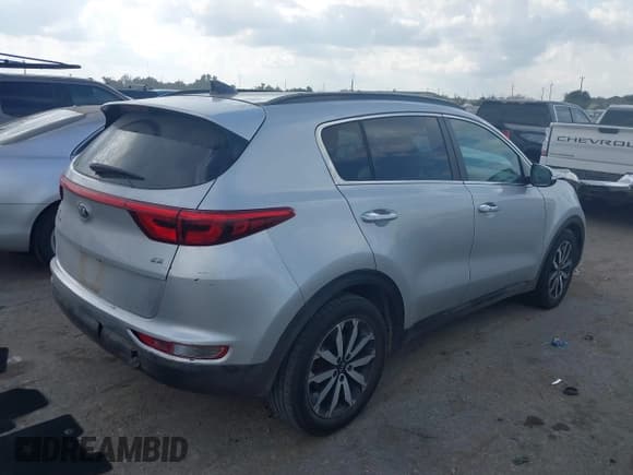 ✅ 2018 Kia Sportage EX • VIN: KNDPN3AC8J7418244 • Lot: 43766552. Listed on IAAI with 135,454 mi. Free auction sales archive from the USA and detailed vehicle history report at DreamBid. Image 4.