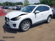 ✅ 2014 Mazda CX-5 Grand Touring • VIN: JM3KE4DY3E0351047 • Lot: 42802433. Wystawiony na IAAI z przebiegiem 61 544 mil. Bezpłatny archiwum sprzedaży aukcyjnych z USA i szczegółowy raport historii pojazdu na DreamBid. Zdjęcie 2.
