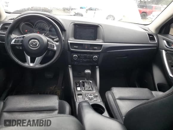 ✅ 2016 Mazda CX-5 Grand Touring • VIN: JM3KE4DY1G0803211 • Лот: 89537495. Опубликован ранее на Copart с пробегом 255 646 миль. Бесплатный доступ к архиву аукционных продаж из США и подробный отчёт об истории автомобиля на DreamBid. Изображение 8.