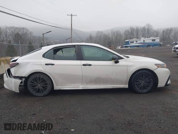 2021 Toyota Camry SE with VIN 4T1T11BK9MU033412, listed as a IAAI auction lot 41474773 with 52,330 mi miles and . Bid and sale history available at DreamBid. Image 13.