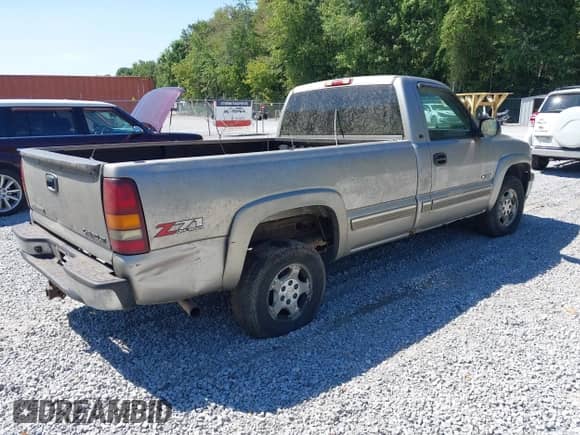 2002 Chevrolet Silverado 1500 LS with VIN 1GCEK14T52Z230125, listed as a IAAI auction lot 43144958 with 143,167 mi miles and . Bid and sale history available at DreamBid. Image 4.