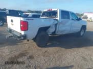 ✅ 2018 Chevrolet Silverado 1500 LT • VIN: 3GCUKREC2JG373136 • Lot: 43377912. Wystawiony na IAAI z przebiegiem 113 869 mil. Bezpłatny archiwum sprzedaży aukcyjnych z USA i szczegółowy raport historii pojazdu na DreamBid. Zdjęcie 4.