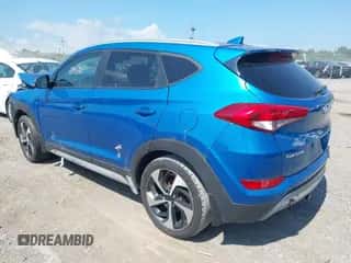 2018 Hyundai Tucson Sport z VIN KM8J3CAL5JU793002, wystawiony jako IAAI lot #42966828 z przebiegiem 78 273 mil mil oraz . Historia ofert i sprzedaży dostępna na DreamBid. Obrazek 3.