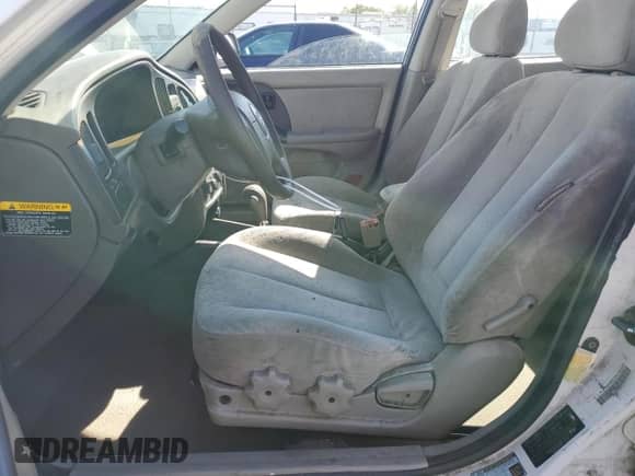 2004 Hyundai Elantra GLS with VIN KMHDN46D34U725333, listed as a Copart auction lot 71259335 with 242,751 mi miles and Salvage title. Bid and sale history available at DreamBid. Image 7.
