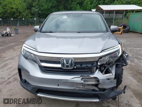 ✅ 2021 Honda Pilot EX • VIN: 5FNYF5H36MB039437 • Lot: 42542622. Listed on IAAI with 65,098 mi. Free auction sales archive from the USA and detailed vehicle history report at DreamBid. Image 12.
