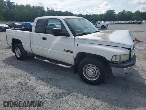 ✅ 2002 Dodge 2500 • VIN: 3B7KC23602M313447 • Lot: 56666355. Listed on Copart with 235,214 mi. Free auction sales archive from the USA and detailed vehicle history report at DreamBid. Image 4.