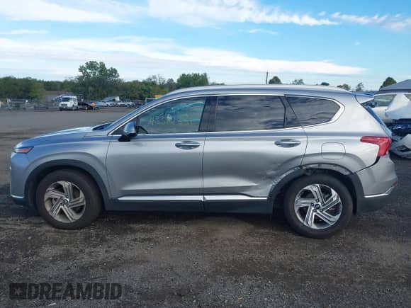 2023 Hyundai Santa Fe SEL with VIN 5NMS34AJXPH524877, listed as a IAAI auction lot 43312881 with 63,983 mi miles and . Bid and sale history available at DreamBid. Image 14.