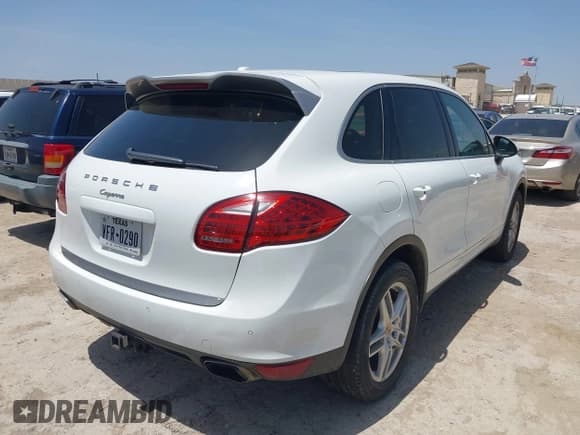 ✅ 2014 Porsche Cayenne • VIN: WP1AA2A21ELA93242 • Лот: 42762961. Опубликован ранее на IAAI с пробегом 99 017 миль. Бесплатный доступ к архиву аукционных продаж из США и подробный отчёт об истории автомобиля на DreamBid. Изображение 4.