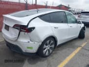 ✅ 2023 Tesla Model Y Long Range • VIN: 7SAYGAEE9PF702910 • Lot: 42199519. Wystawiony na IAAI z przebiegiem 91 094 mil. Bezpłatny archiwum sprzedaży aukcyjnych z USA i szczegółowy raport historii pojazdu na DreamBid. Zdjęcie 4.