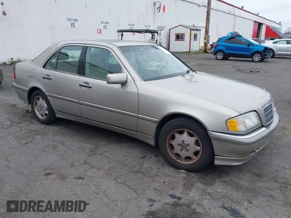 ✅ 1998 Mercedes-Benz C 230/260/280/320 • VIN: WDBHA23G8WA610332 • Lot: 41772716. Listed on IAAI with 248,664 mi. Free auction sales archive from the USA and detailed vehicle history report at DreamBid. Image 1.