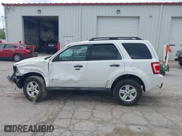 ✅ 2010 Ford Escape Hybrid • VIN: 1FMCU4K30AKC27870 • Lot: 42246083. Listed on IAAI with 127,782 mi. Free auction sales archive from the USA and detailed vehicle history report at DreamBid. Image 14.