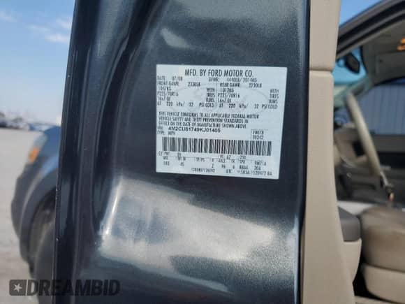 2009 Mercury Mariner с VIN 4M2CU81749KJ01405, выставлен на аукционе Copart как лот 82547795 с пробегом 133 000 миль миль и Списание • Salvage title. История ставок и продаж доступна на DreamBid. Изображение 13.