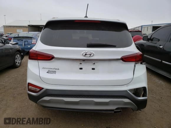 ✅ 2019 Hyundai Santa Fe SE • VIN: 5NMS23AD0KH122169 • Lot: 71083432. Wystawiony na Copart z przebiegiem 52 559 mil. Bezpłatny archiwum sprzedaży aukcyjnych z USA i szczegółowy raport historii pojazdu na DreamBid. Zdjęcie 6.