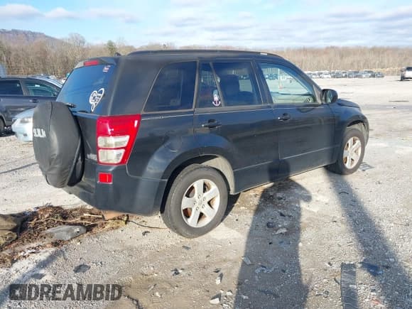 ✅ 2010 Suzuki Grand Vitara XSport • VIN: JS3TE0D4XA4100453 • Lot: 41603012. Listed on IAAI with 210,039 mi. Free auction sales archive from the USA and detailed vehicle history report at DreamBid. Image 4.