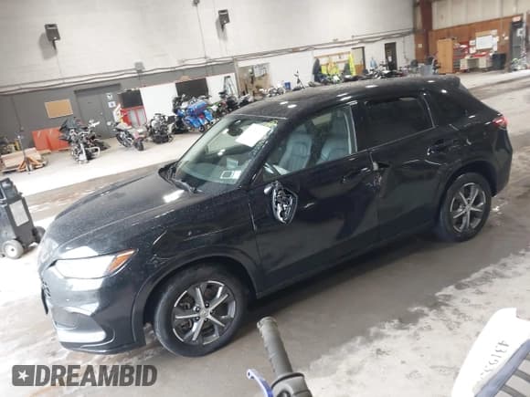 ✅ 2024 Honda HR-V EX-L • VIN: 3CZRZ2H7XRM768373 • Lot: 43304641. Listed on IAAI with 54,633 mi. Free auction sales archive from the USA and detailed vehicle history report at DreamBid. Image 2.