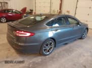 ✅ 2020 Ford Fusion Titanium • VIN: 3FA6P0RU9LR141705 • Lot: 43534413. Listed on IAAI with 119,638 mi. Free auction sales archive from the USA and detailed vehicle history report at DreamBid. Image 4.