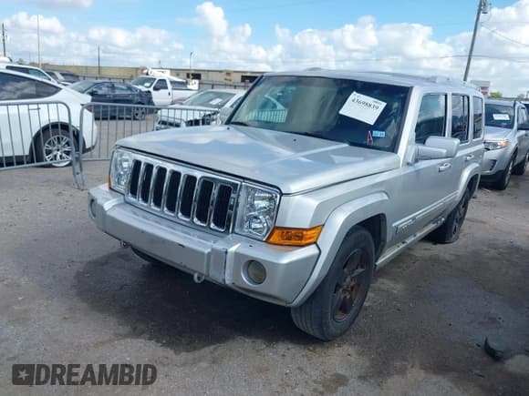 ✅ 2006 Jeep Commander • VIN: 1J8HH48N86C248368 • Lot: 43698839. Listed on IAAI with 157,947 mi. Free auction sales archive from the USA and detailed vehicle history report at DreamBid. Image 2.