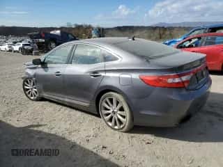 2013 Hyundai Azera z VIN KMHFH4JG0DA249500, wystawiony jako Copart lot #78507004 z przebiegiem 126 295 mil mil oraz Szkoda całkowita • Salvage title. Historia ofert i sprzedaży dostępna na DreamBid. Obrazek 2.