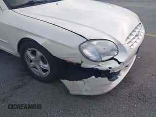 2000 Hyundai Sonata z VIN KMHWF25S3YA327184, wystawiony jako IAAI lot #41771540 z przebiegiem 84 783 mil mil oraz . Historia ofert i sprzedaży dostępna na DreamBid. Obrazek 6.