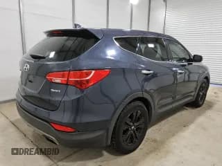✅ 2015 Hyundai Santa Fe • VIN: 5XYZT3LB2FG248377 • Лот: 86866035. Опубликован ранее на Copart с пробегом 140 304 миль. Бесплатный доступ к архиву аукционных продаж из США и подробный отчёт об истории автомобиля на DreamBid. Изображение 3.