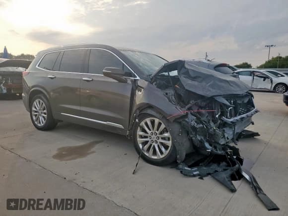 ✅ 2020 Cadillac XT6 FWD Premium Luxury • VIN: 1GYKPCRS7LZ156461 • Lot: 68670805. Listed on Copart with 86,487 mi. Free auction sales archive from the USA and detailed vehicle history report at DreamBid. Image 4.