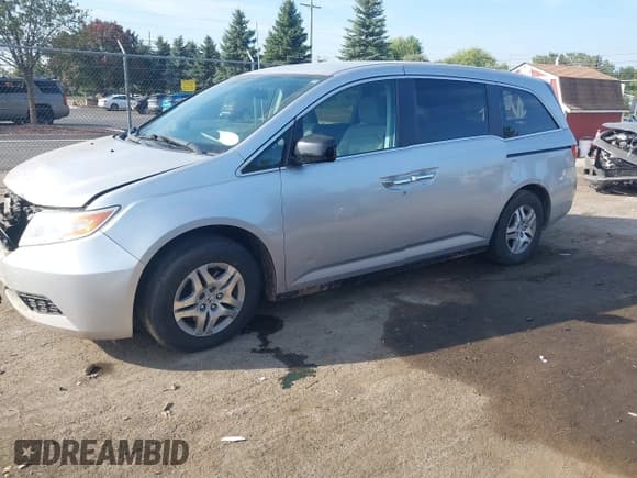 ✅ 2013 Honda Odyssey EX • VIN: 5FNRL5H45DB082818 • Lot: 43243100. Listed on IAAI with 201,051 mi. Free auction sales archive from the USA and detailed vehicle history report at DreamBid. Image 2.