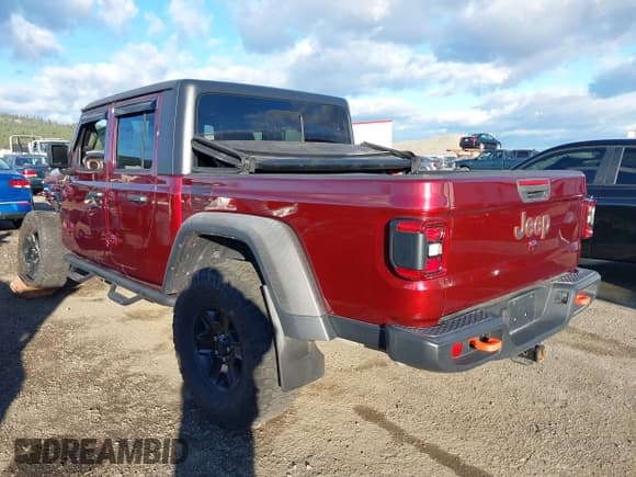 ✅ 2021 Jeep Gladiator Mojave • VIN: 1C6JJTEG8ML607297 • Lot: 43772700. Listed on IAAI with 32,447 mi. Free auction sales archive from the USA and detailed vehicle history report at DreamBid. Image 3.