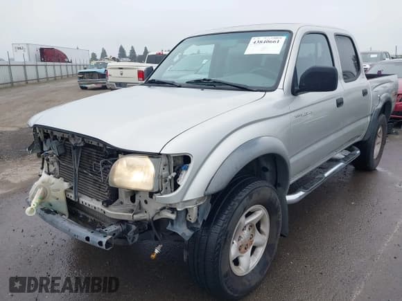 ✅ 2001 Toyota Tacoma PreRunner • VIN: 5TEGN92N51Z765722 • Lot: 43840661. Listed on IAAI with 205,791 mi. Free auction sales archive from the USA and detailed vehicle history report at DreamBid. Image 18.