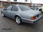 ✅ 1988 BMW 6 Series • VIN: WBAEC8414J3266701 • Lot: 43871516. Listed on IAAI with 129,828 mi. Free auction sales archive from the USA and detailed vehicle history report at DreamBid. Image 3.