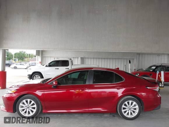 2019 Toyota Camry LE with VIN 4T1B11HK9KU681980, listed as a IAAI auction lot 43083575 with 117,268 mi miles and . Bid and sale history available at DreamBid. Image 14.