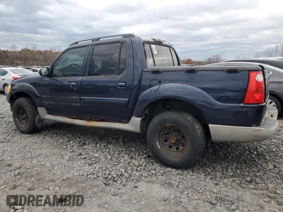 ✅ 2003 Ford Explorer Sport Trac XLS • VIN: 1FMZU77E13UB07895 • Lot: 90637575. Listed on Copart with 203,918 mi. Free auction sales archive from the USA and detailed vehicle history report at DreamBid. Image 2.