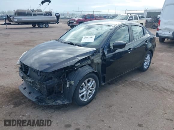 ✅ 2016 Scion iA • VIN: 3MYDLBZV2GY120886 • Lot: 43582142. Wystawiony na IAAI z przebiegiem 162 778 mil. Bezpłatny archiwum sprzedaży aukcyjnych z USA i szczegółowy raport historii pojazdu na DreamBid. Zdjęcie 2.