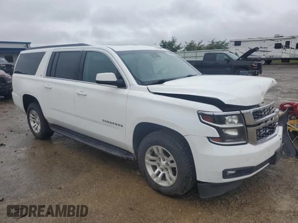 ✅ 2016 Chevrolet Suburban LT • VIN: 1GNSKHKC2GR285628 • Lot: 82416725. Listed on Copart with 150,747 mi. Free auction sales archive from the USA and detailed vehicle history report at DreamBid. Image 4.
