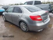 ✅ 2010 Suzuki Kizashi SE • VIN: JS2RE9A33A6100068 • Lot: 41802860. Listed on IAAI with 133,306 mi. Free auction sales archive from the USA and detailed vehicle history report at DreamBid. Image 3.