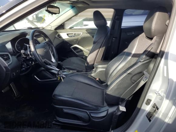 ✅ 2015 Hyundai Veloster • VIN: KMHTC6AD1FU241877 • Lot: 83806504. Listed on Copart with 86,867 mi. Free auction sales archive from the USA and detailed vehicle history report at DreamBid. Image 7.