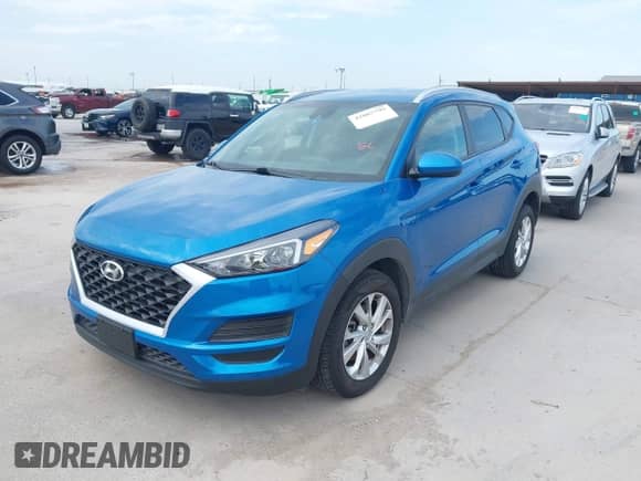 2019 Hyundai Tucson Value with VIN KM8J33A44KU957253, listed as a IAAI auction lot 42887799 with 57,676 mi miles and . Bid and sale history available at DreamBid. Image 2.