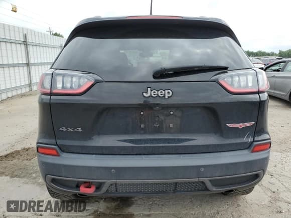 ✅ 2020 Jeep Cherokee Trailhawk • VIN: 1C4PJMBX5LD562549 • Lot: 63055805. Listed on Copart with 100,274 mi. Free auction sales archive from the USA and detailed vehicle history report at DreamBid. Image 6.
