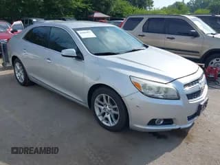✅ 2013 Chevrolet Malibu Eco • VIN: 1G11F5RR2DF116412 • Lot: 42981857. Listed on IAAI with 164,109 mi. Free auction sales archive from the USA and detailed vehicle history report at DreamBid. Image 1.