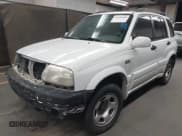 ✅ 2002 Suzuki Grand Vitara JLX • VIN: JS3TD62V824156720 • Lot: 42058409. Wystawiony na IAAI z przebiegiem Nie podano. Bezpłatny archiwum sprzedaży aukcyjnych z USA i szczegółowy raport historii pojazdu na DreamBid. Zdjęcie 2.
